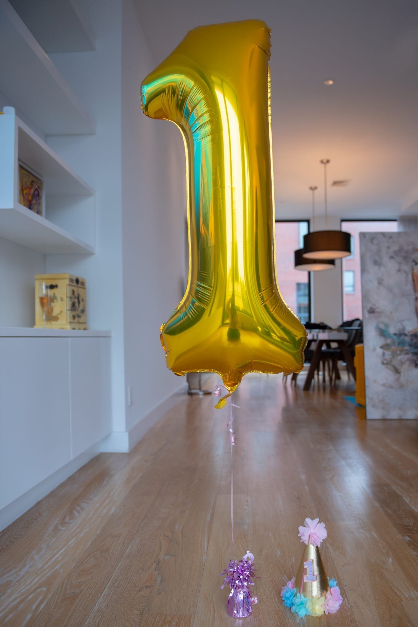 5 Essentials for an Unforgettable First Birthday Photoshoot at Home First Birthday Photoshoot. First Birthday Photoshoot Ideas. Jumbo Balloon. Helium Number 1 Balloon. Gold Balloon Number 1. Kid's Birthday Party Hat.