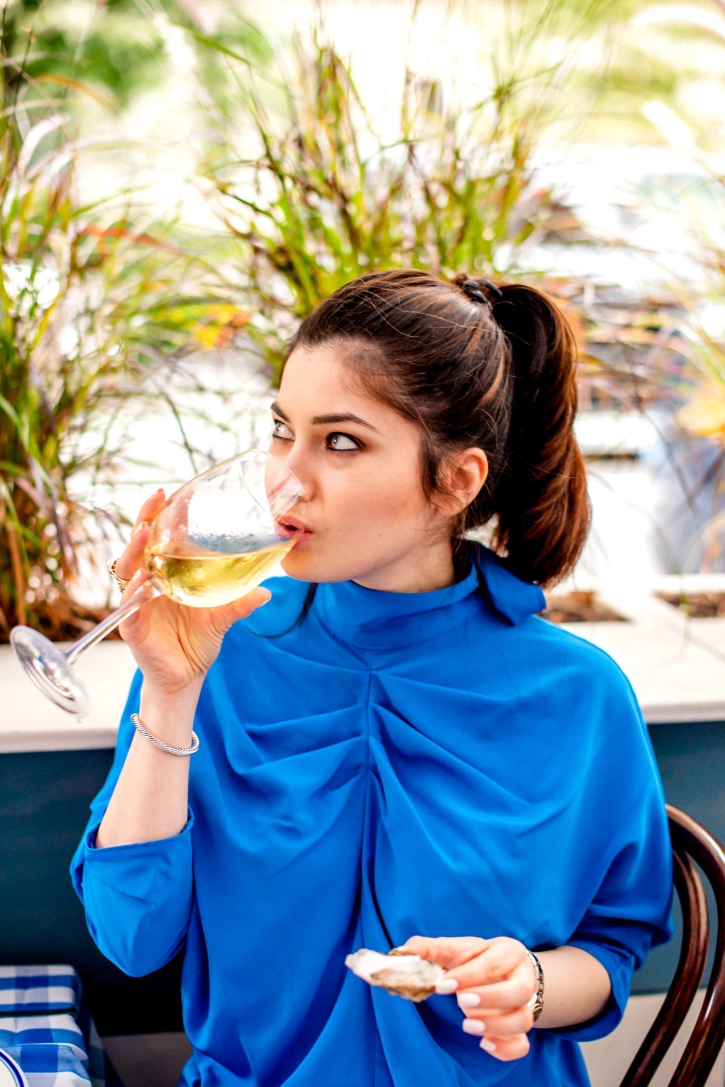 Claudette Woman Sipping a Glass of Wine
