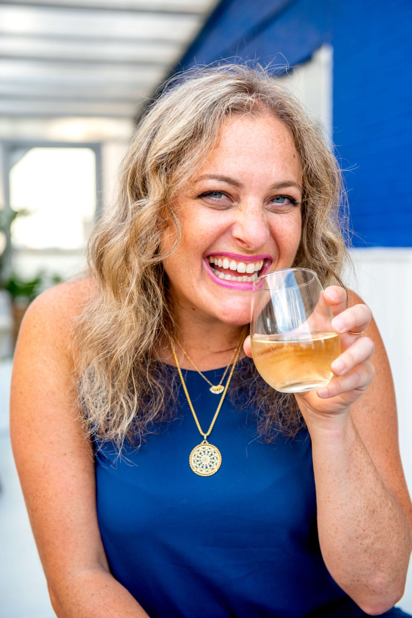 The Best Summer 2021 Rooftops in NYC: Sandbar Woman Sipping Wine at Sandbar