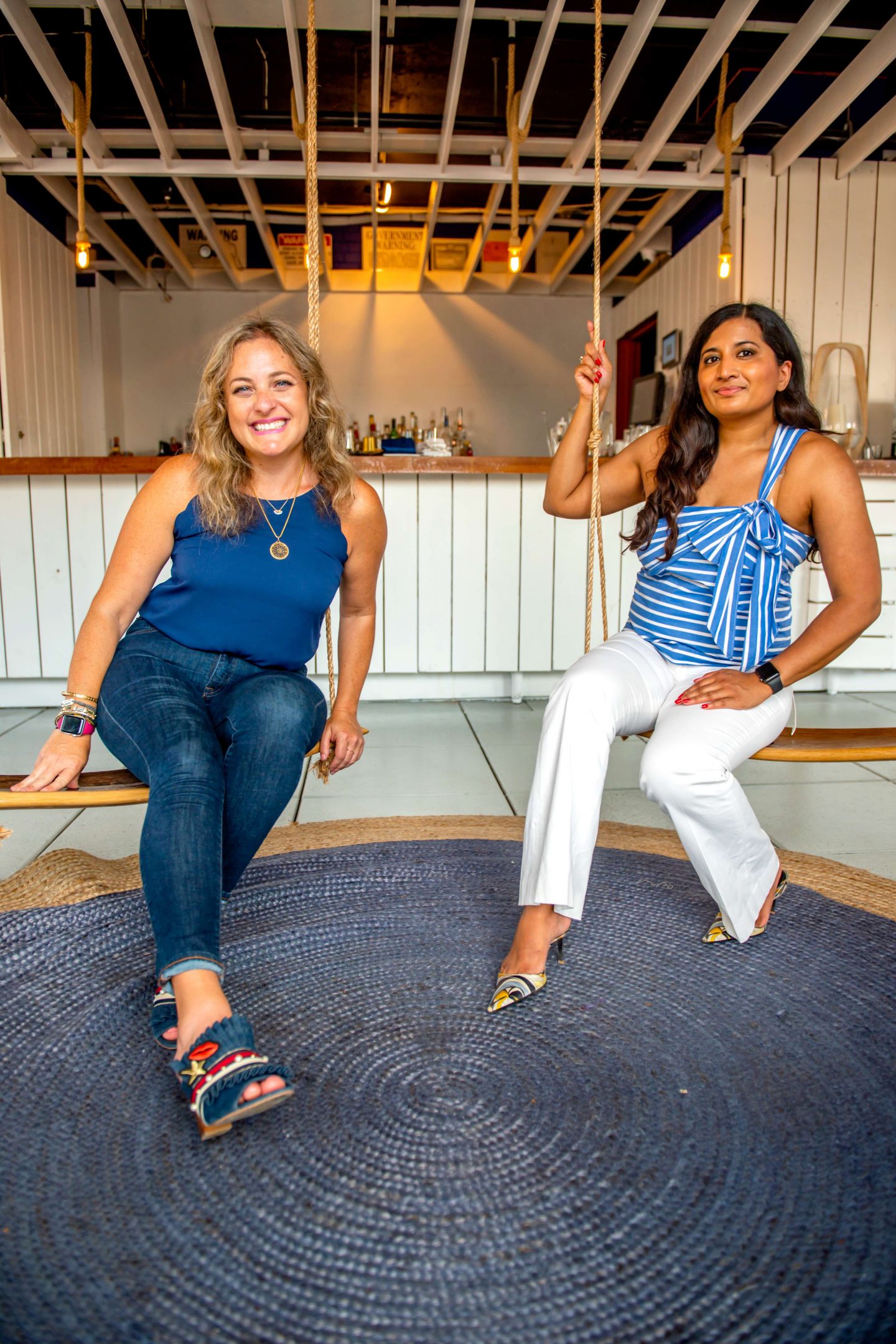 The Best Summer 2021 Rooftops in NYC: Sandbar Women at Sandbar Swings; best summer 2021 rooftops in NYC