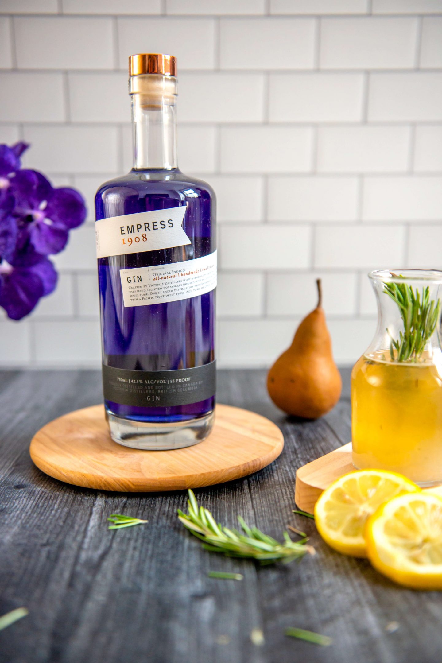 Replica Surfaces Review: The Best Product Photography Backdrops in 2022 Empress Gin - Pear Rosemary Lemon Cocktail. Replica Surfaces Review. The Best Product Photography Backdrops in 2022. Subway Tile and Weathered Wood.
