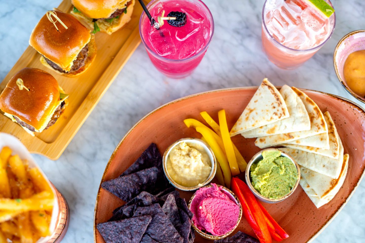 Somewhere Nowhere Cocktails, Sliders, Fries, Hummus Platter. Best Rooftops in Chelsea. 