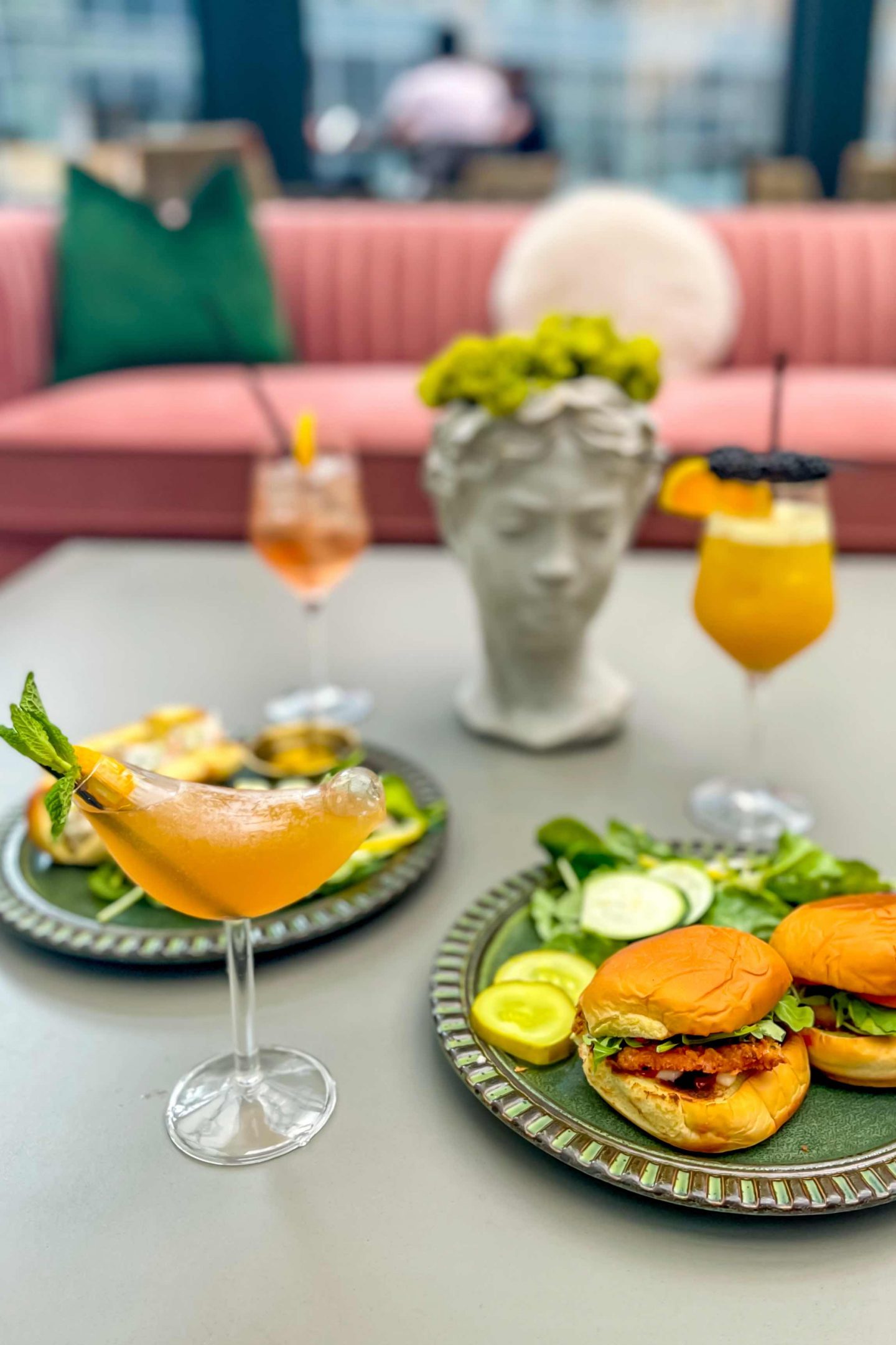 Best Rooftops in Nomad in 2021: The Glass Ceiling Rooftop Glass Ceiling Cocktails, Chicken Sliders and Shrimp & Crab Rolls. Best Rooftops in Nomad.