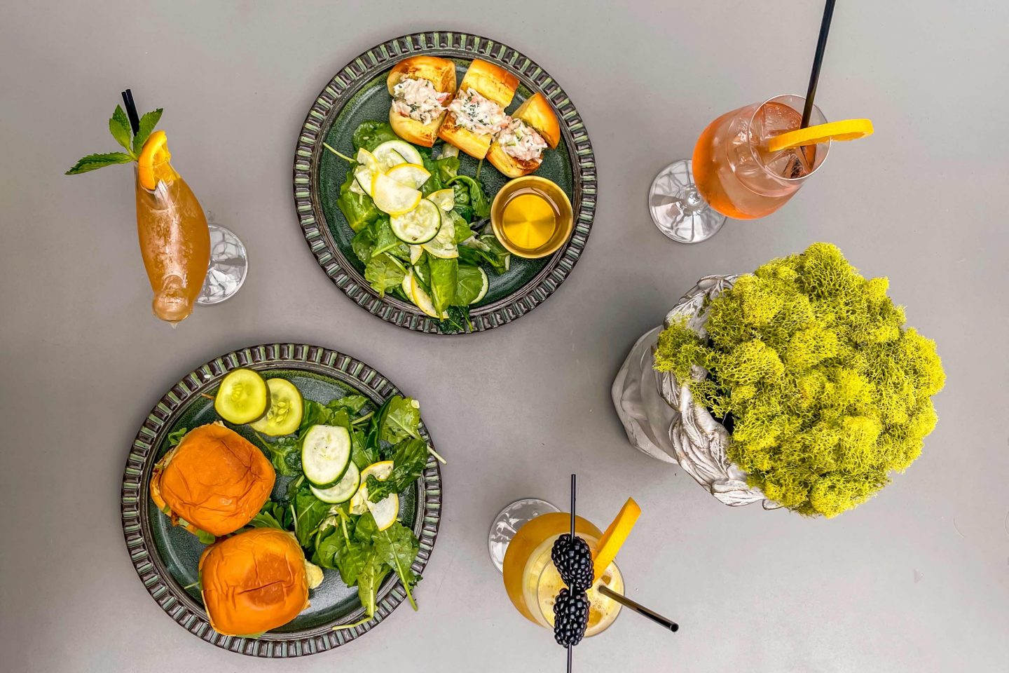 Best Rooftops in Nomad in 2021: The Glass Ceiling Rooftop Glass Ceiling Cocktails, Chicken Sliders and Shrimp & Crab Rolls. Best Rooftops in Nomad