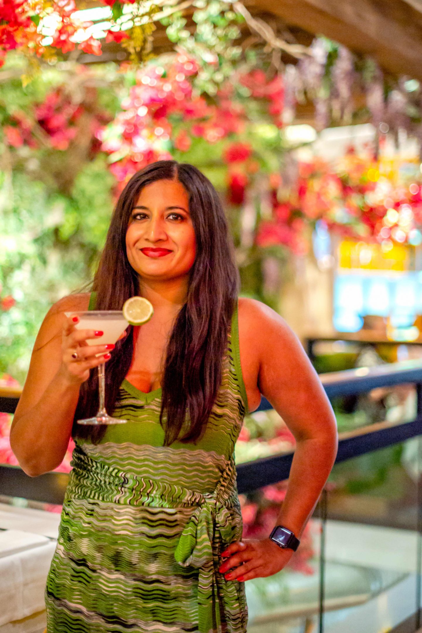 Casa Limone - Woman Holding a Cocktail. Best Italian restaurants in midtown.