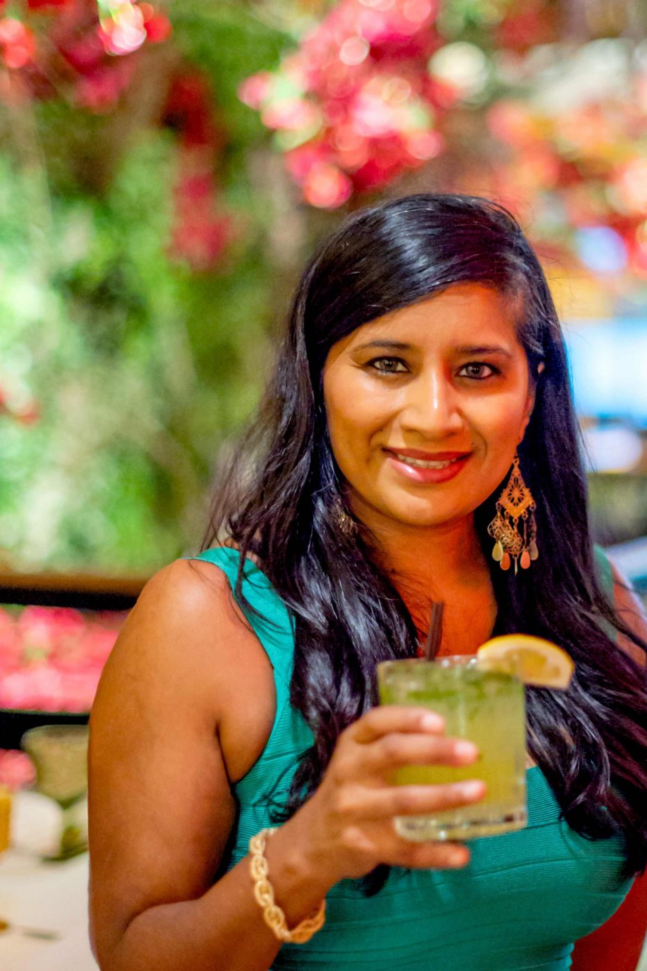 Casa Limone - Woman Holding a Cocktail.Best Italian restaurants in midtown 