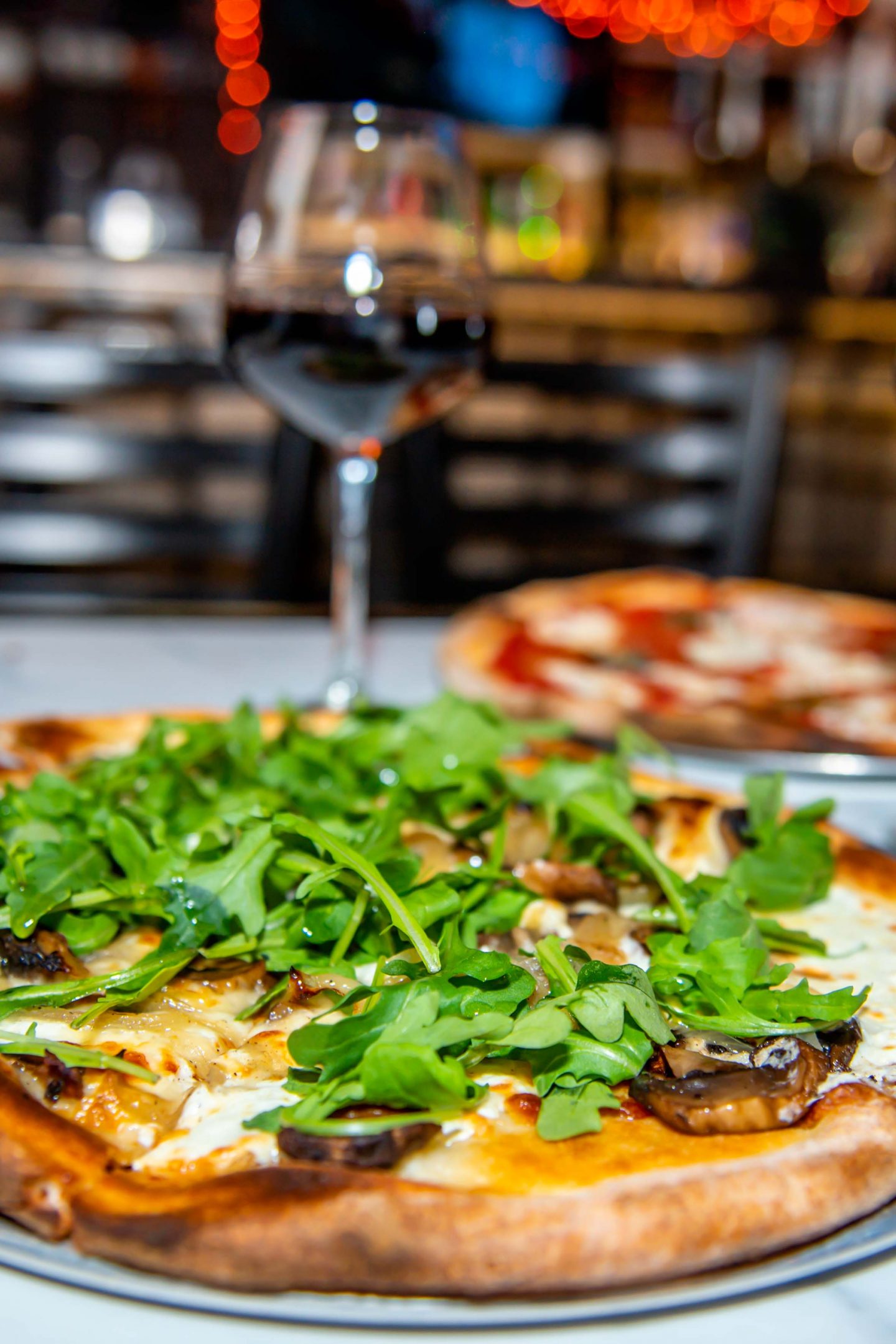 The Best Group Dining in Hudson Square 2021: Adoro Lei Adoro Lei Margherita and Truffle Pizzas. Best Group Dining in Hudson Square.