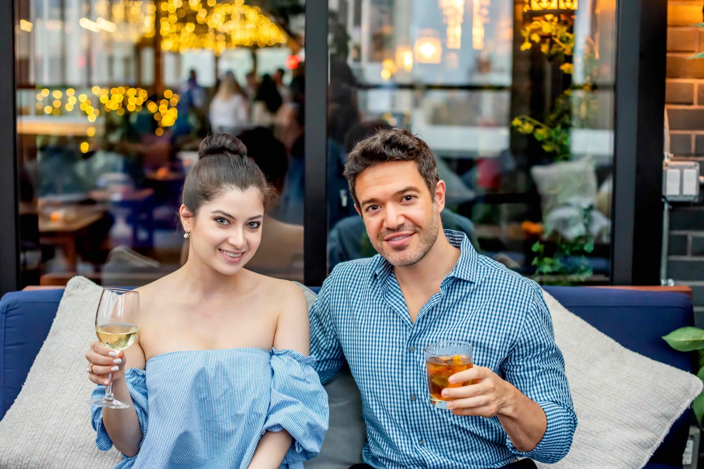 Elsie Rooftop Couple with Cocktails. Best rooftops in Midtown in 2022. 