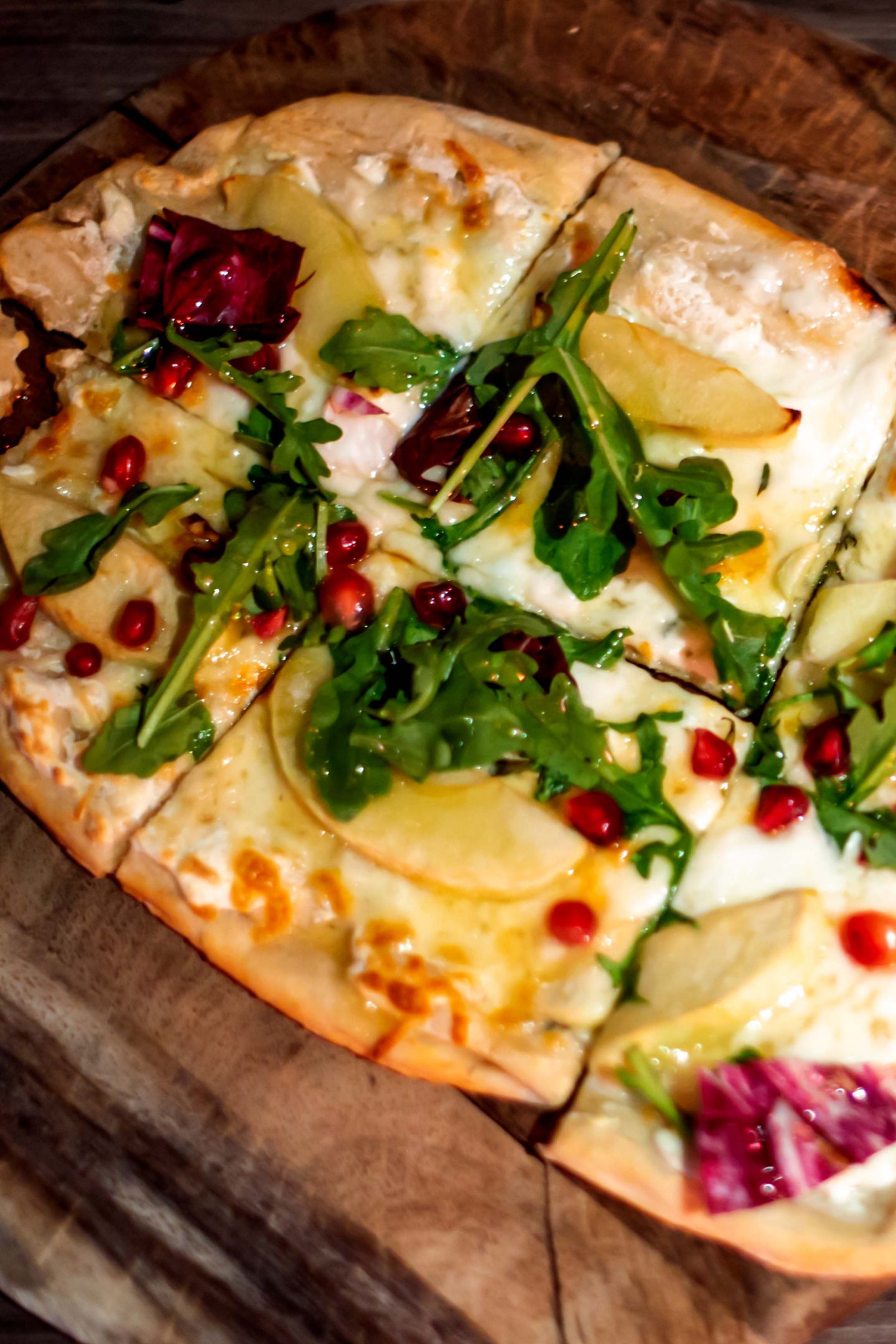 Versa Rooftop. White Flatbread with Pear, Pomegranate and Arugula. Best Rooftops in Midtown Manhattan.