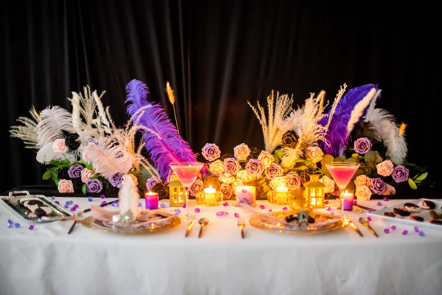 CV linens 1920s decor: faux flowers and feathers. Best New Year's Eve Party Ideas.