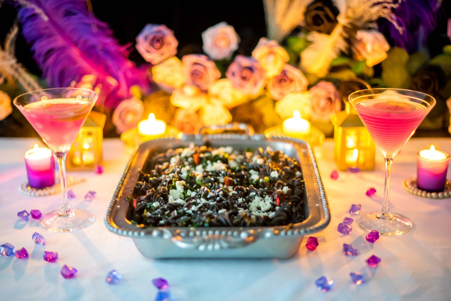 Squid Ink Pasta, French 75 and CV linens faux flowers and feathers. Best New Year's Eve Party Ideas.