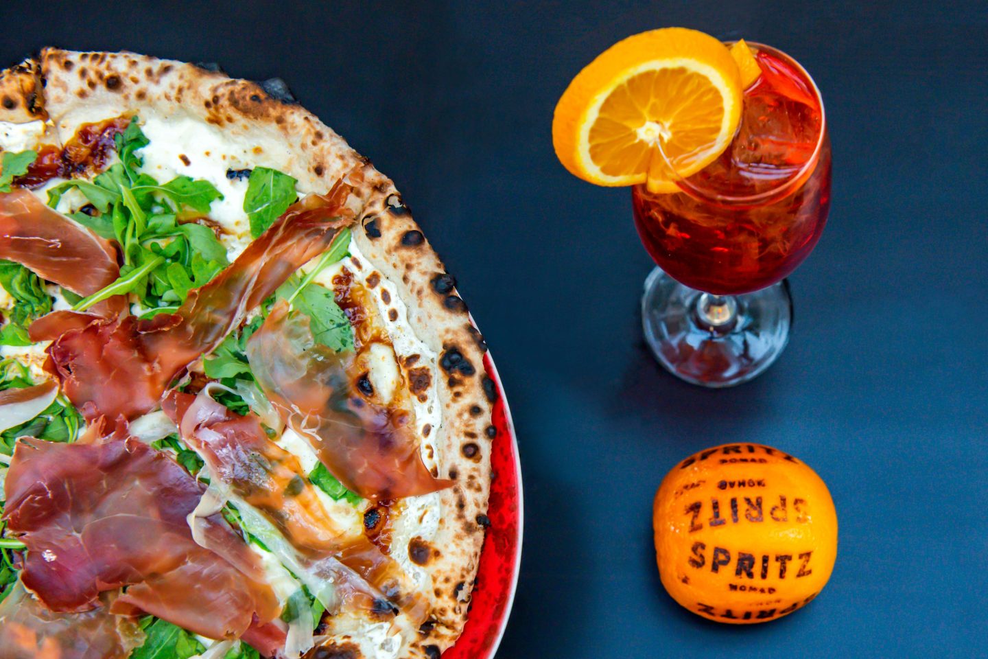 The Best Italian Restaurants in Nomad in 2022: Spritz Nomad Best Italian Restaurants in Nomad. Spritz Nomad. Spritz Figura and Proscuitto Pizza.