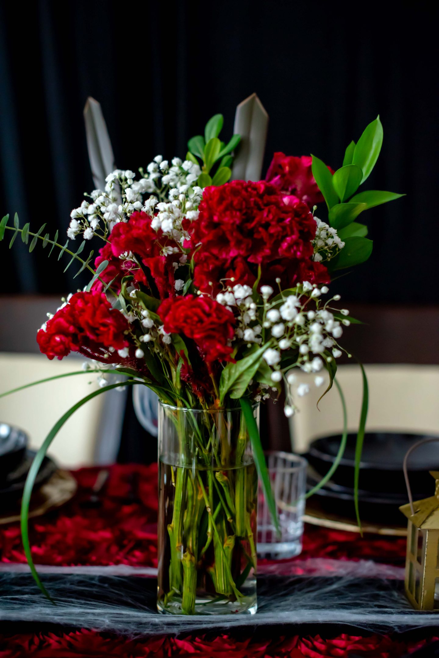 Easy Halloween Dinner Ideas for Adults with Mikasa in 2022 Burgundy and Black Halloween Ideas. Burgundy Cockscomb flowers and baby's breath.