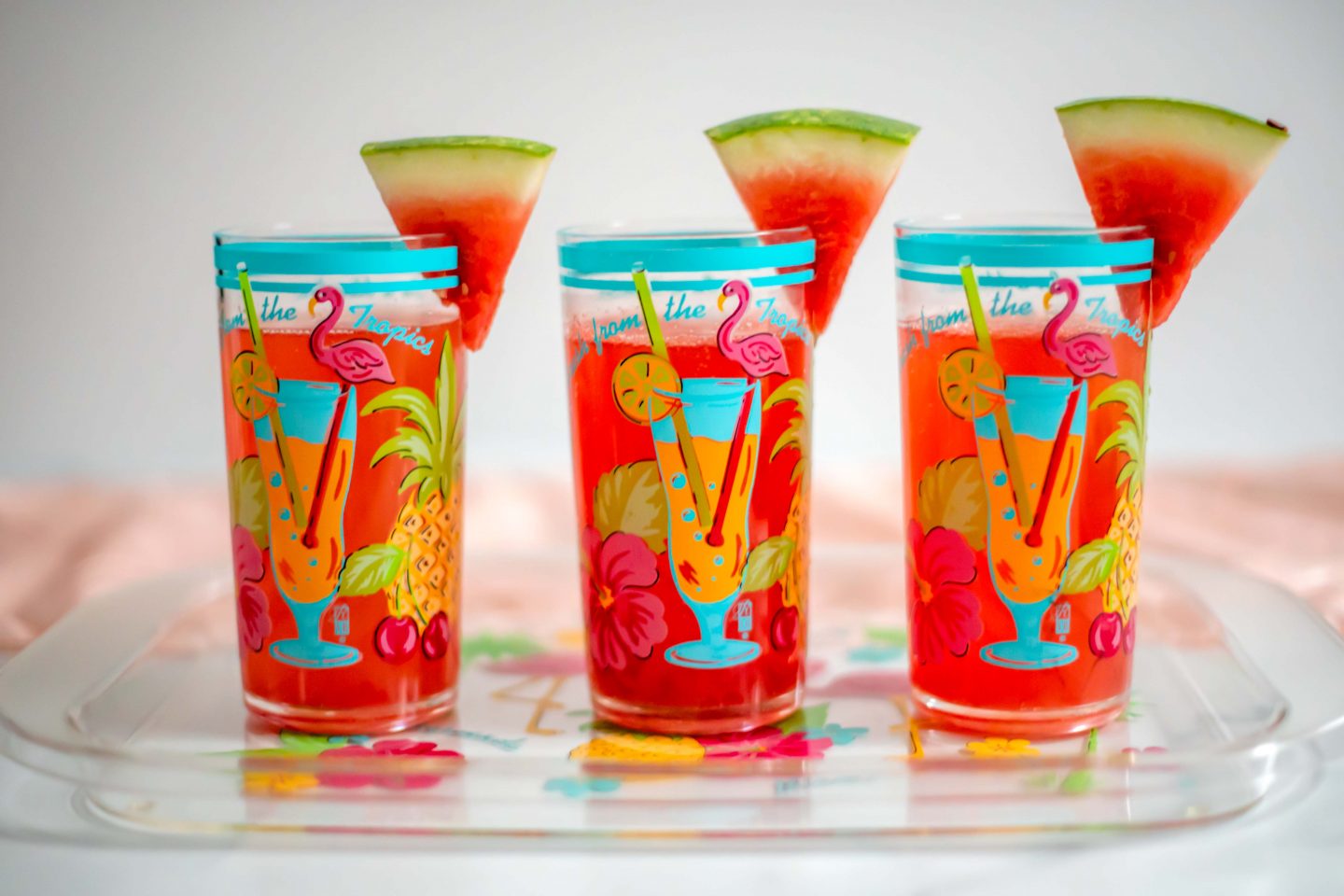 Easy, Delicious 2-Ingredient Watermelon Mocktail: Taste Summer in a Glass Watermelon Mocktail Recipe. Tropical glasses.