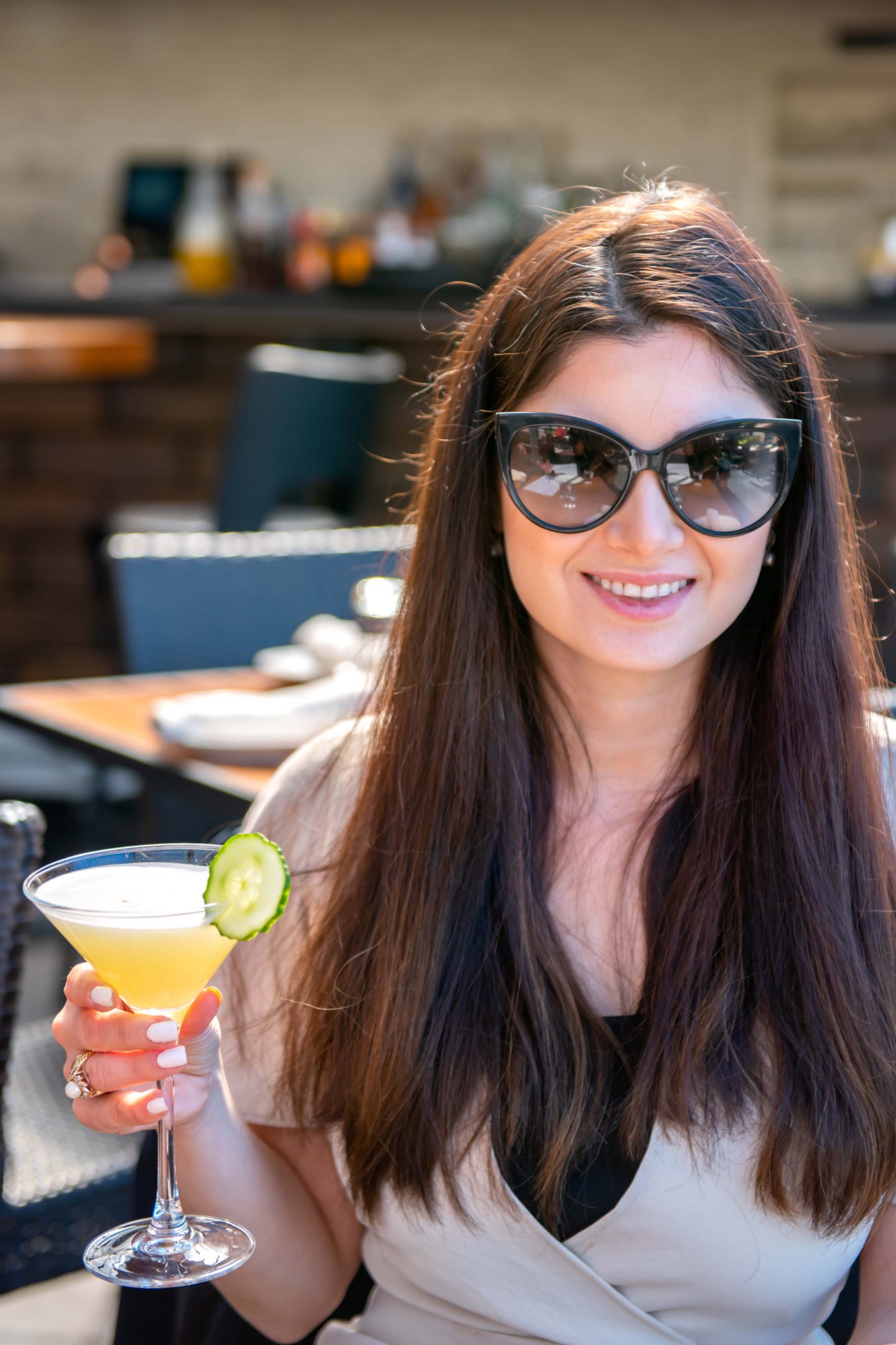 The Best Brunch in NYC in 2022: STK Rooftop Review Best Brunch in NYC. STK Rooftop Review. Lady with brunch cocktail at STK Rooftop. Cucumber Stiletto.