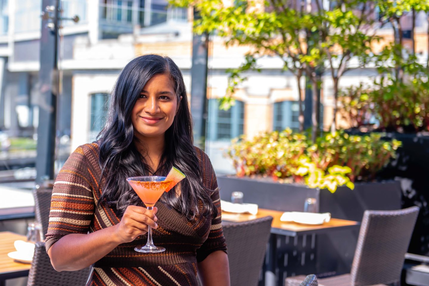 The Best Brunch in NYC in 2022: STK Rooftop Review Best Brunch in NYC. STK Rooftop Review. Ladiy with brunch cocktail at STK Rooftop. Spiced Watermelon.