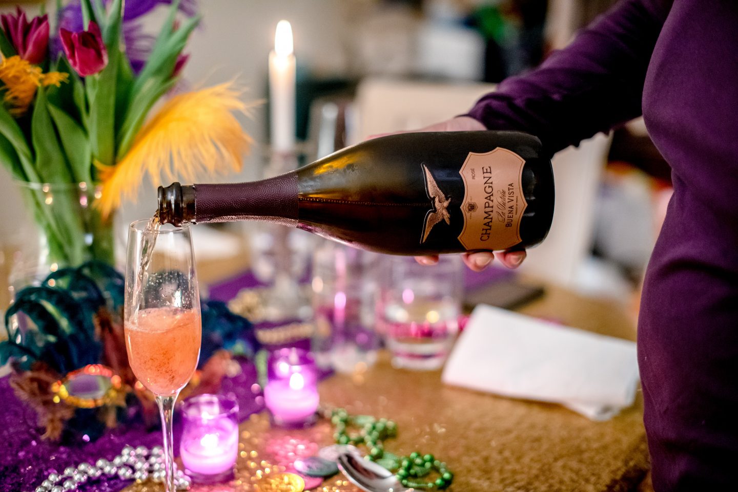 Ideas for a Mardi Gras Party. Mardi Gras decorations. Mardi Gras dinner party. Mardi Gras tablescape. Champagne. Buena Vista La Victoire Brut Champagne. 