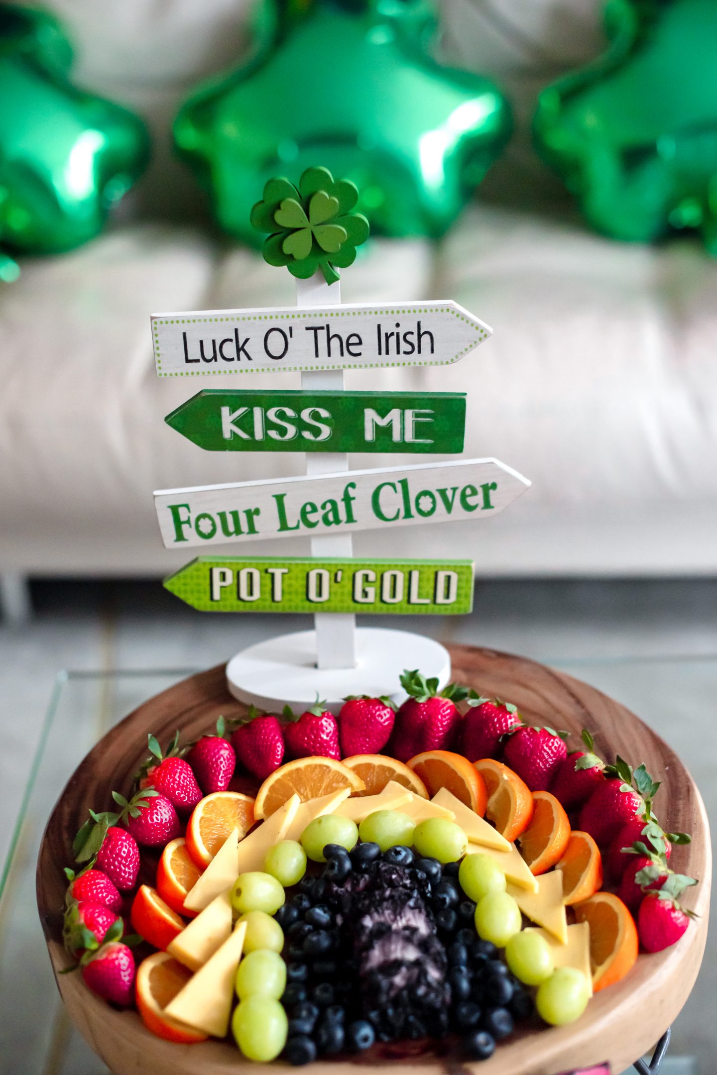 5 Best St. Patrick's Day Decorations to Transform Your Home St. Patrick's Day Decorations. Shamrock balloons. Rainbow fruit board. Rainbow cheese board.