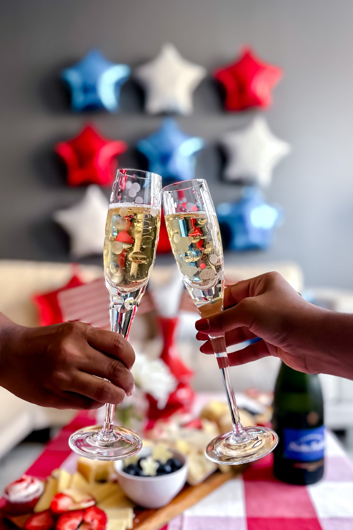 Best July 4th Decor Ideas: How to Celebrate Independence Day in Style July 4th Decor Ideas. Red, white and blue cheese board. Red and white gingham tablecloth. Red, white and blue star balloons. American flags. Nicolas Feuillatte.