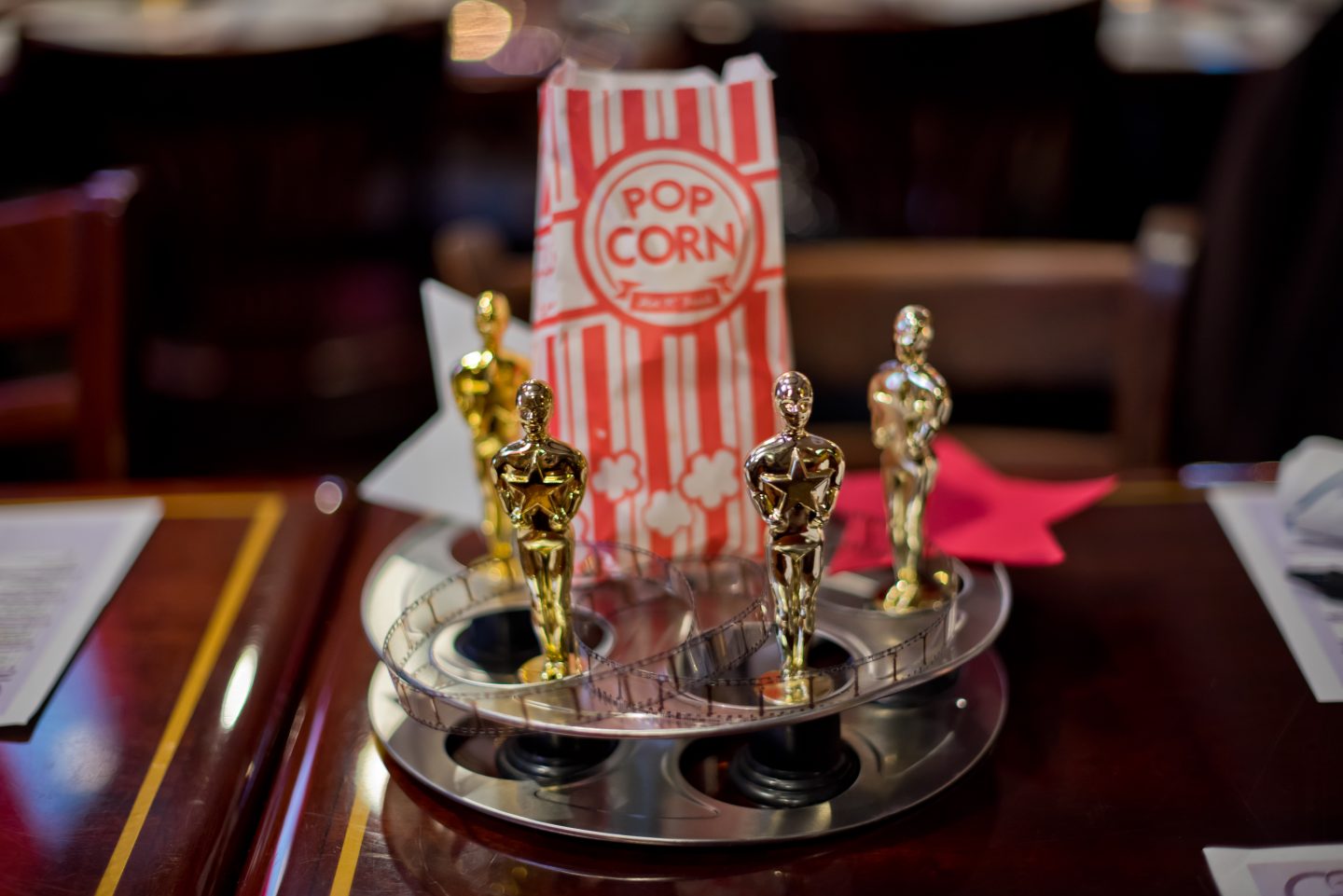 Roll Out the Red Carpet: 9 Best Oscars Party Ideas for a Glamorous Night Oscars Party Ideas. Oscars Centerpieces. Clapboard. Popcorn.