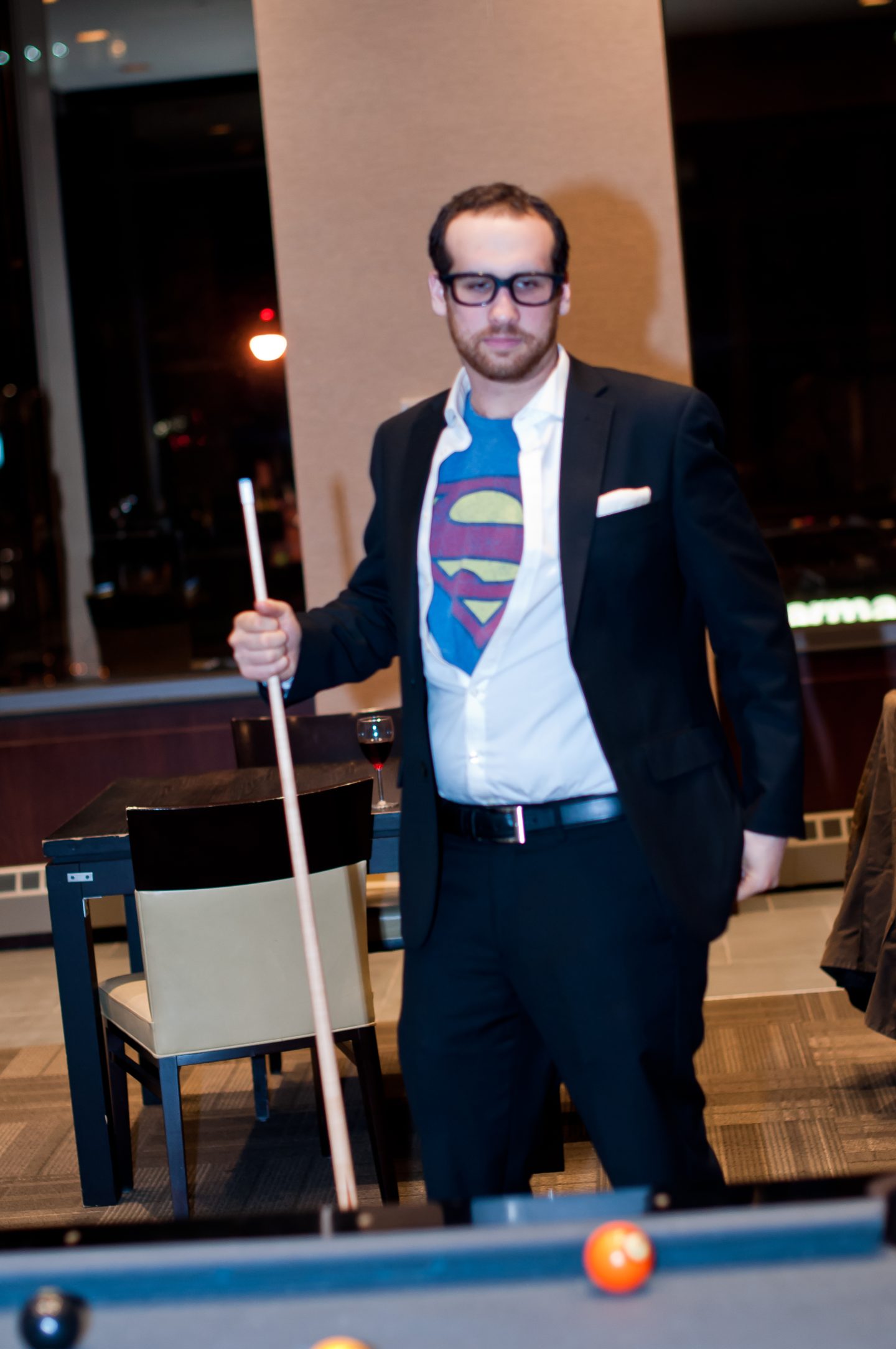 Halloween dinner party. Halloween costumes. Superman. 