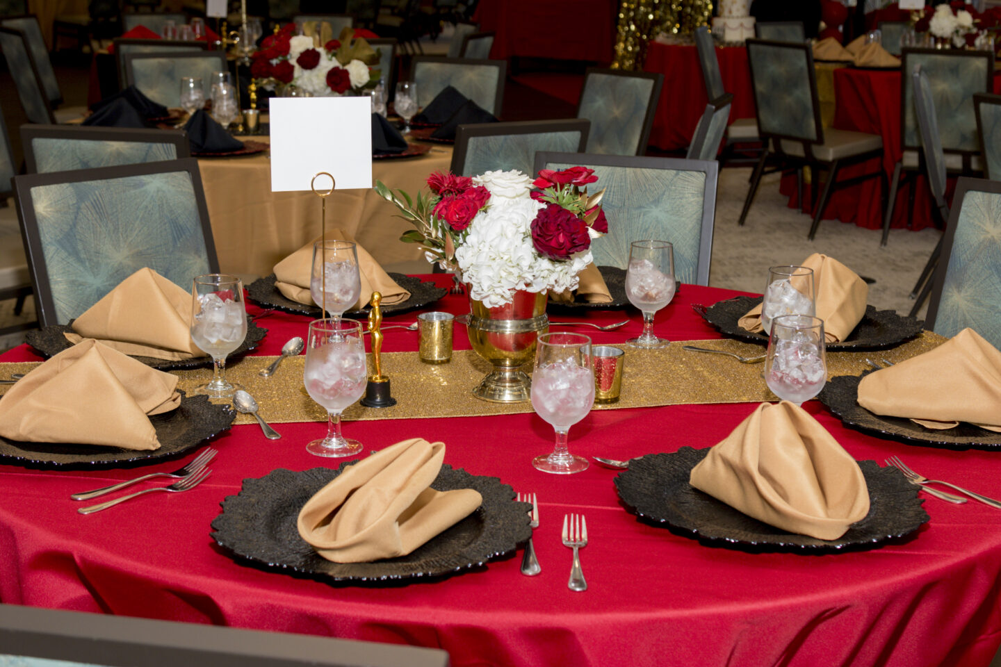 Bollywood Oscars Party. 75th Birthday Party. Indian Party. Bollywood Theme Party. CV Linens. Red, black and white tablescape. 