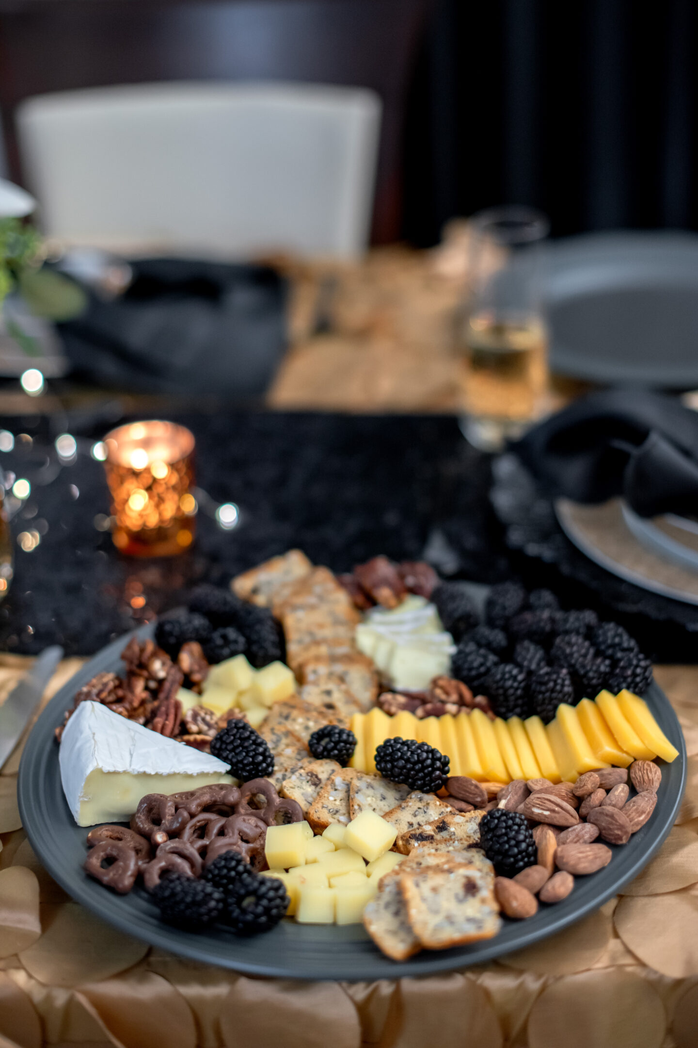 Unveiling 11 Stunning Black and Gold New Year's Eve Party Ideas: Dazzle into the New Year Black and Gold New Year's Eve Party Ideas. Black and White Cheeseboard.