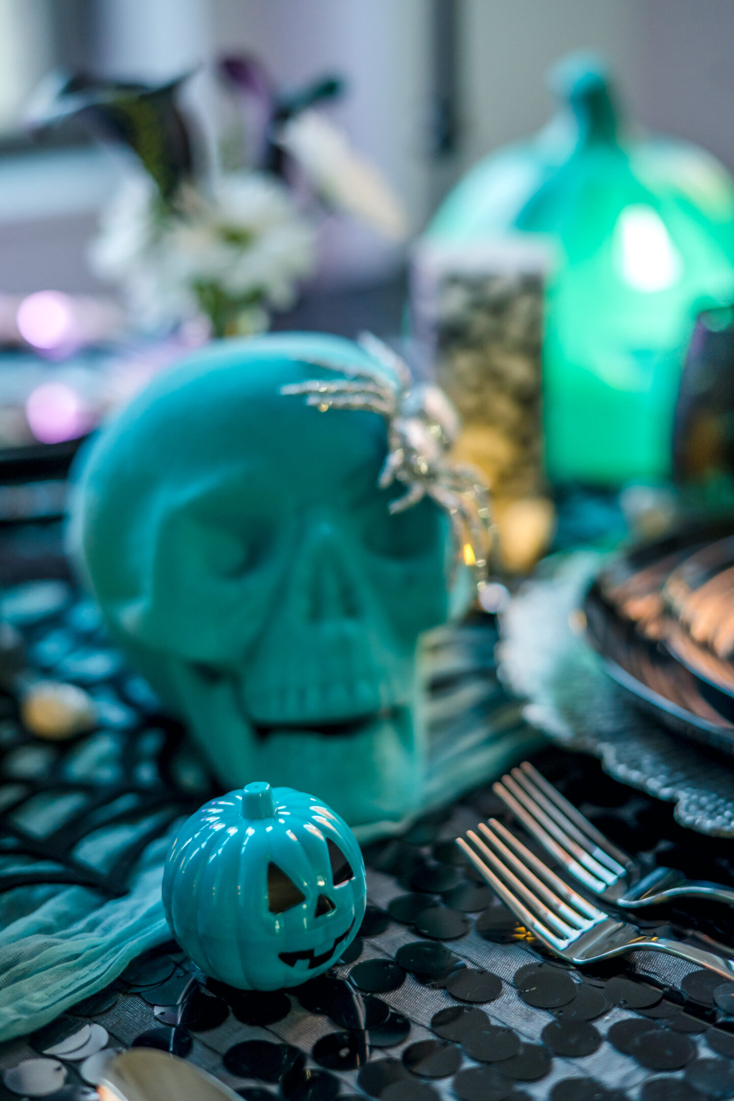 10 Stunning Black and Teal Halloween Party Ideas: Ghoulish Halloween Theme Ideas Teal Halloween Tablescape. Halloween Theme.