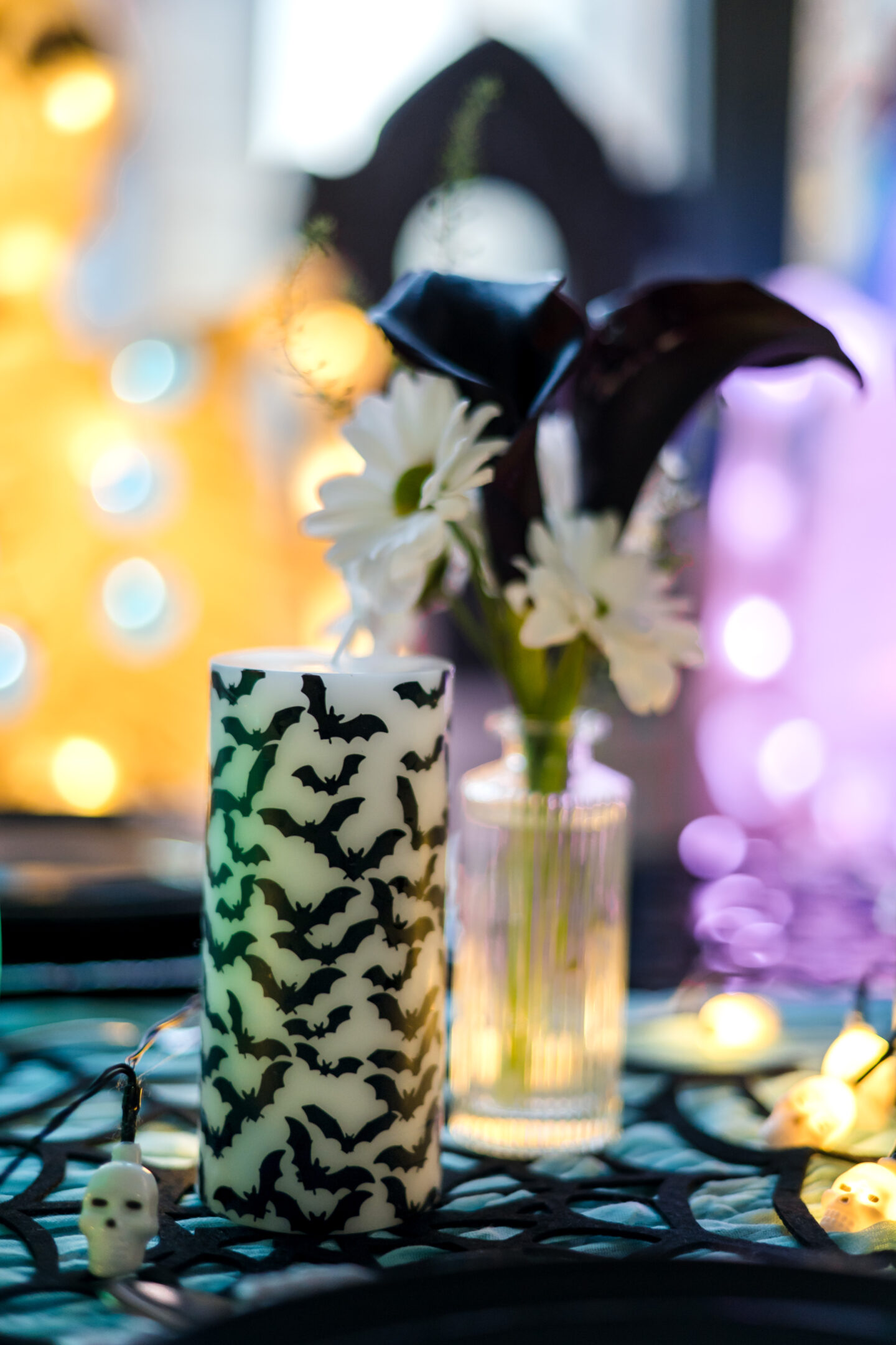 10 Stunning Black and Teal Halloween Party Ideas: Ghoulish Halloween Theme Ideas Teal Halloween Tablescape. Halloween Theme. Bat Candles.