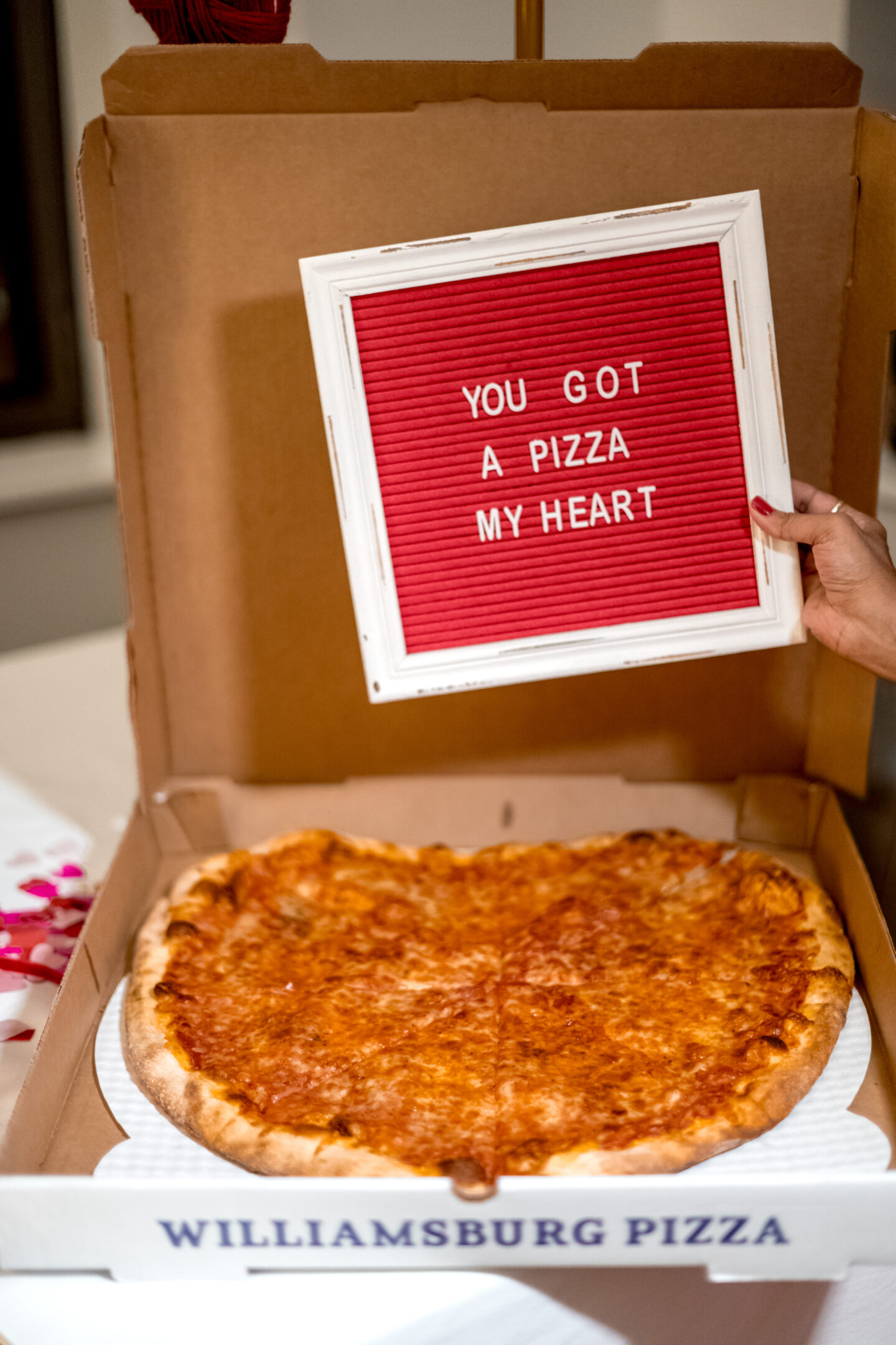 7 Irresistible Ways to Celebrate with Heart Shaped Pizza for Valentine's Day Valentine's Day party. Heart Shaped Pizza for Valentine's Day. Valentine's Day tablescape.