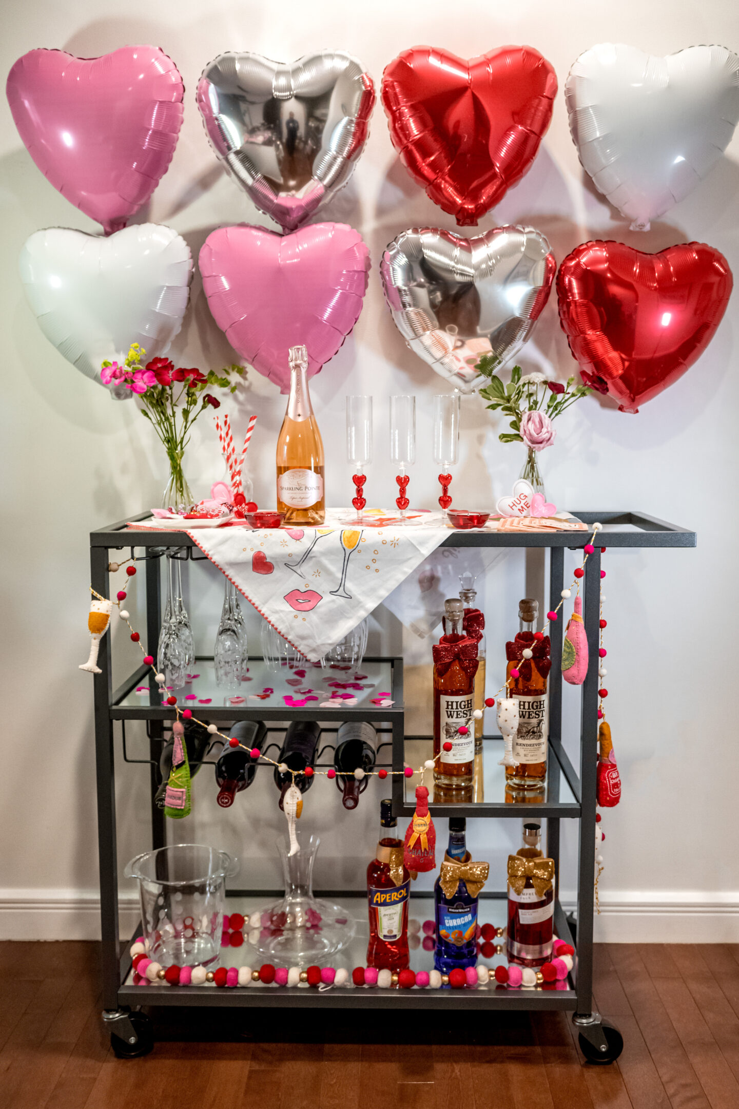 7 Irresistible Ways to Celebrate with Heart Shaped Pizza for Valentine's Day Valentine's Day party. Heart Shaped Pizza for Valentine's Day. Valentine's Day bar cart.