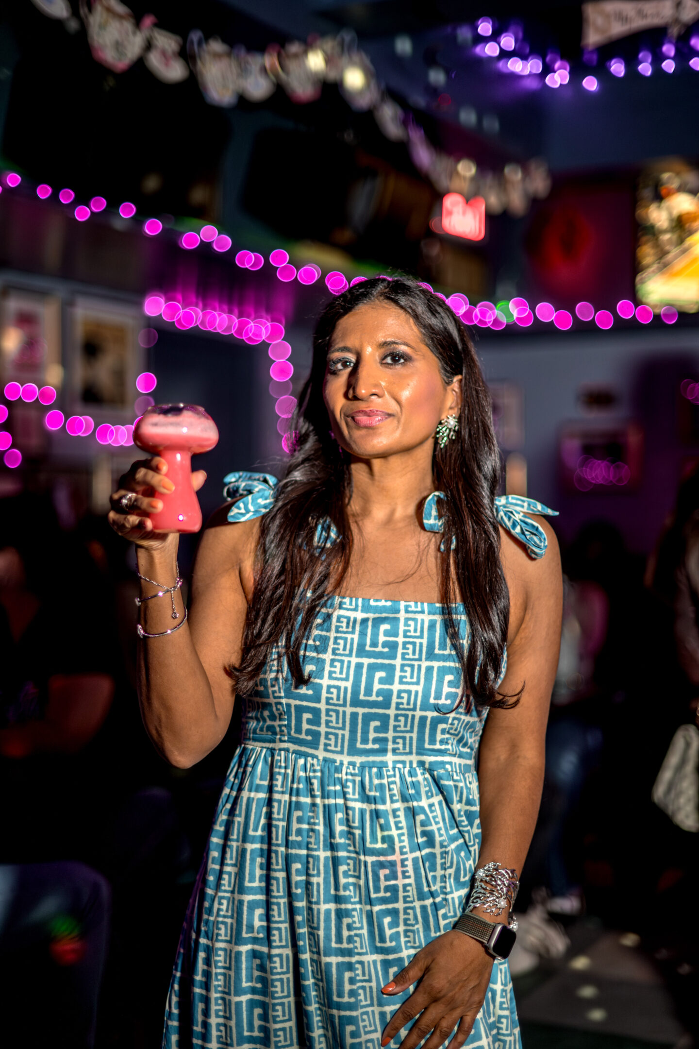Best NYC Summer Restaurants Mean Fiddler Lady holding a drink