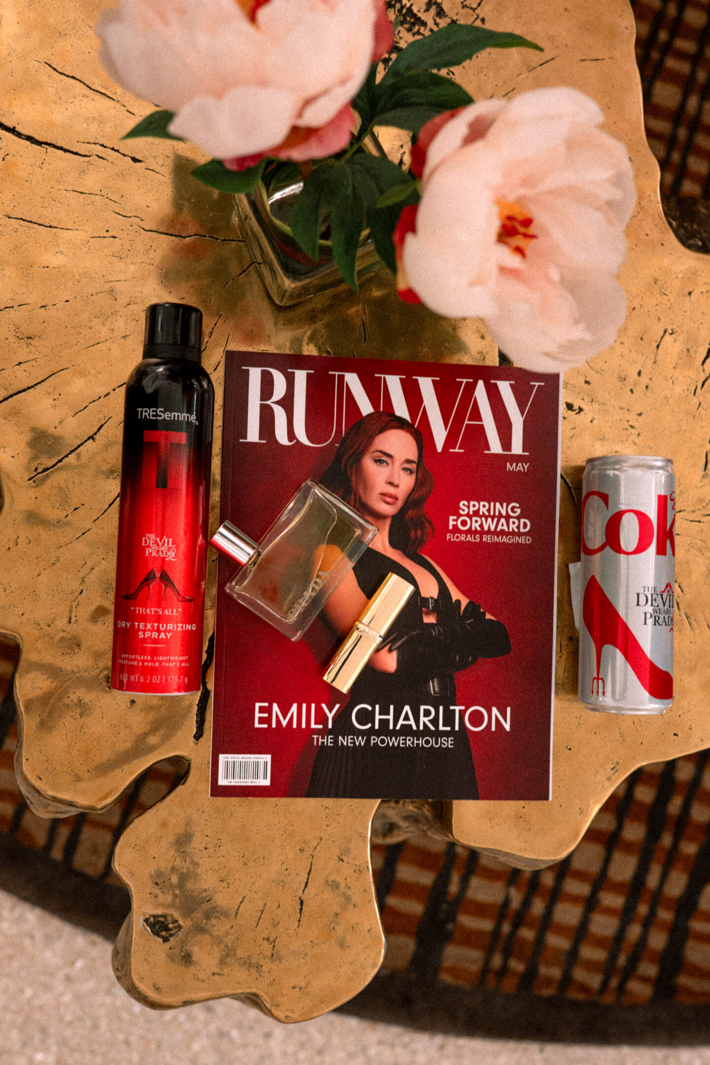 5 Best Things to Wear to The Devil Wears Prada Two Screening The Devil Wears Prada Two Screening: Runway Magazine, Diet Coke, Prada Perfume, L'Oreal Lipstick